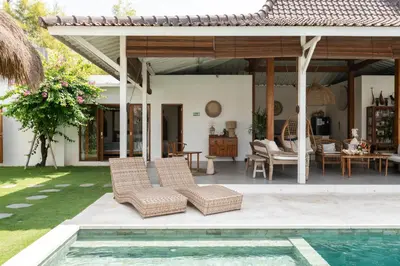 a villa with a swimming pool and a patio at Villa Folie by Alfred in Bali in Seminyak