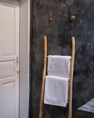 two towels hanging on a chair in a room at Villa Seminyak - 2bdr private big pool villa in Seminyak