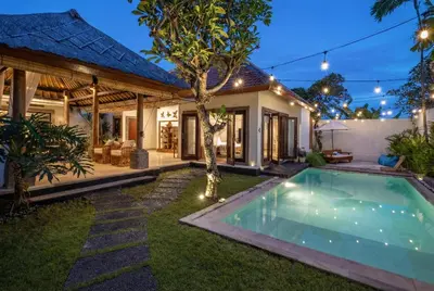 an image of a house with a swimming pool at Rumah Ananda Bali - Balinese Villa Umalas in Canggu