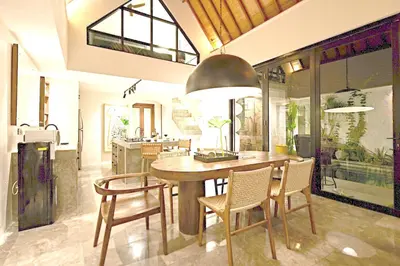 a dining room with a table and chairs at MASARA Villa - 5Min to Canggu - 2Min to Shops & Restaurants in Canggu