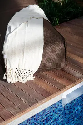 a net on the edge of a swimming pool at Adamare Villa Umalas in Kerobokan