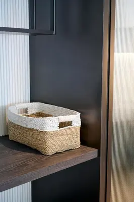 a wicker basket sitting on a shelf at Adamare Villa Umalas in Kerobokan