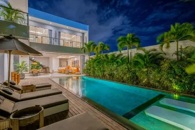an image of a swimming pool in a house at Flores Villa by Betterplace in Canggu