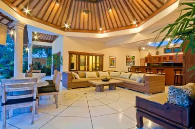 a living room with a couch and a table at Villa Mango - 3 Bedroom Villa in Seminyak in Seminyak